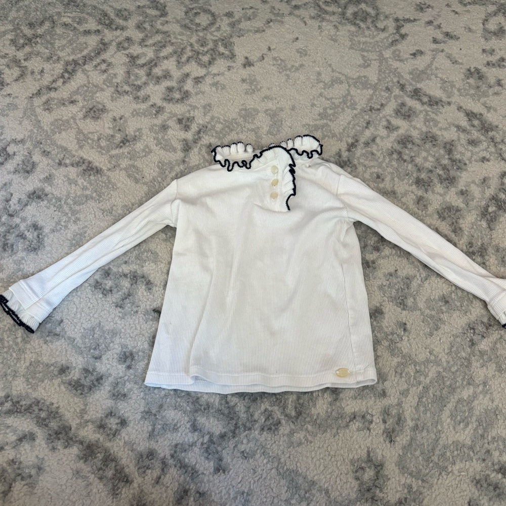 White/Cream Kids Long Sleeve Top with Navy Ruffle Details. Tartine et Chocolat.